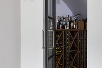 We are frequently seeing steel doors being used for wine cellars...you can see why! Smith Brooke Architects incorporated this one into their designs. Photographs supplied by Smith & Brooke Architects and taken by Chris Snook Photography @snookphotograph.