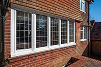 White EB20 steel windows with trickle vents.