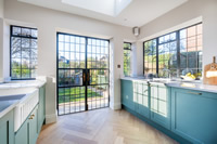 What a kitchen! The newly fitted, bespoke steel windows and doors bring in so much natural light.