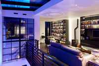 This contemporary apartment in London showcases the latest trend of a stunning steel screen.