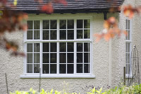 What a quaint property, keeping its character with replacement Clement metal windows.