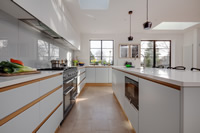 Matching exterior steel screens with windows creates a wonderful effect as you can see here in this modern kitchen.