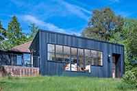Rachel Macgadie from RM Designs added this extension onto the rear of her home to maximise space and allow a stunning view of the countryside.
