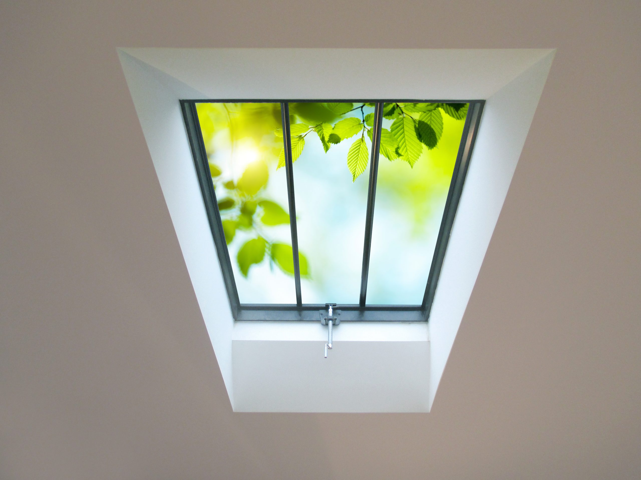 An image of a Clement 4 rooflight with a chrome hand winder.