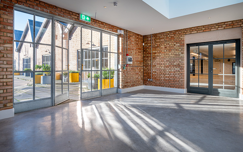 The internal doors at Kew are manufactured by Clement from thermally broken Jansen profiles